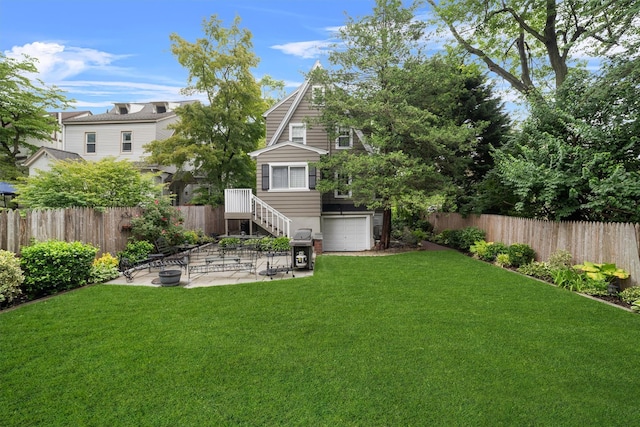 10 Wiltshire St, Bronxville, NY 10708 - back of house with an attached garage and a patio area