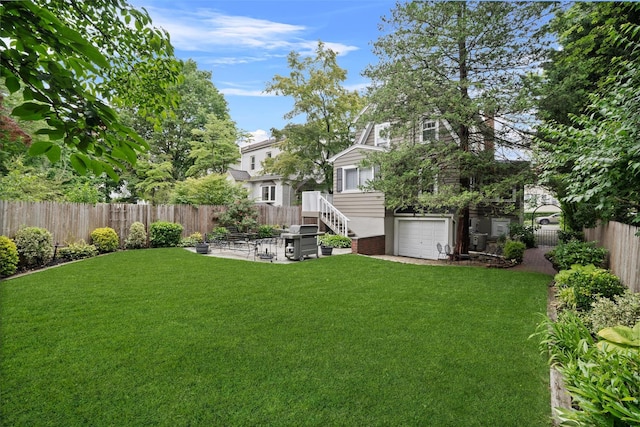 10 Wiltshire St, Bronxville, NY 10708 - fenced backyard featuring a garage and a patio