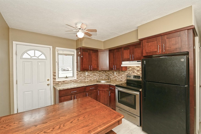 36 Dawes Ave, Syosset, NY 11791 - kitchen featuring freestanding refrigerator, stainless steel range with electric stovetop, ceiling fan, under cabinet range hood, and tasteful backsplash