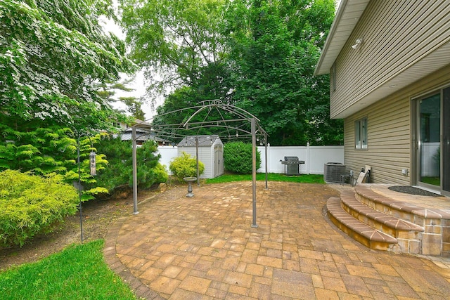 36 Dawes Ave, Syosset, NY 11791 - fenced backyard featuring a storage shed, a patio area, and area for grilling