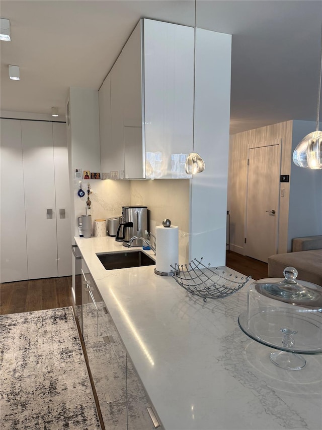 18-05 215th St Unit 2G, Bayside, NY 11360 - kitchen featuring dark wood-style flooring, modern cabinets, and light stone countertops
