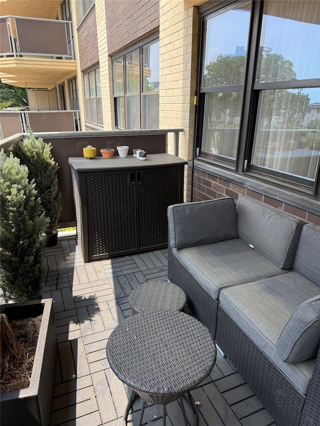 18-05 215th St Unit 2G, Bayside, NY 11360 - view of patio / terrace featuring an outdoor living space