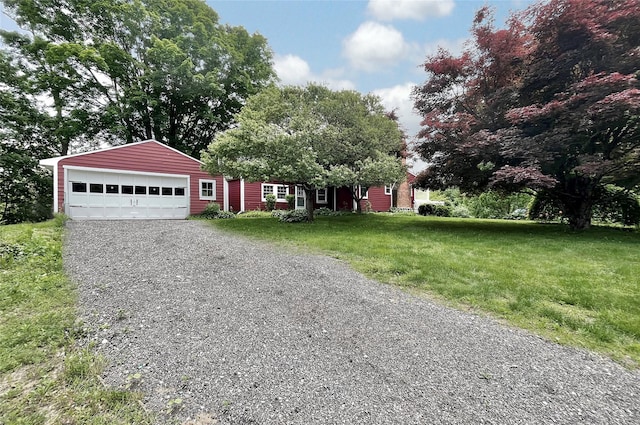 28 Gobblers Knob Rd, Pawling, NY 12564 - view of front of home with a garage and a front lawn