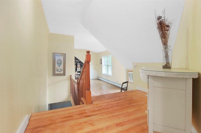 28 Gobblers Knob Rd, Pawling, NY 12564 - hall featuring an upstairs landing, baseboard heating, wood finished floors, and lofted ceiling