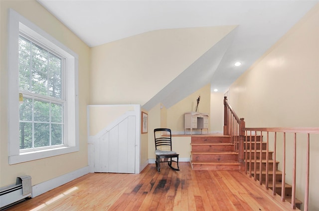 28 Gobblers Knob Rd, Pawling, NY 12564 - living area featuring a baseboard radiator, plenty of natural light, vaulted ceiling, wood-type flooring, and stairway