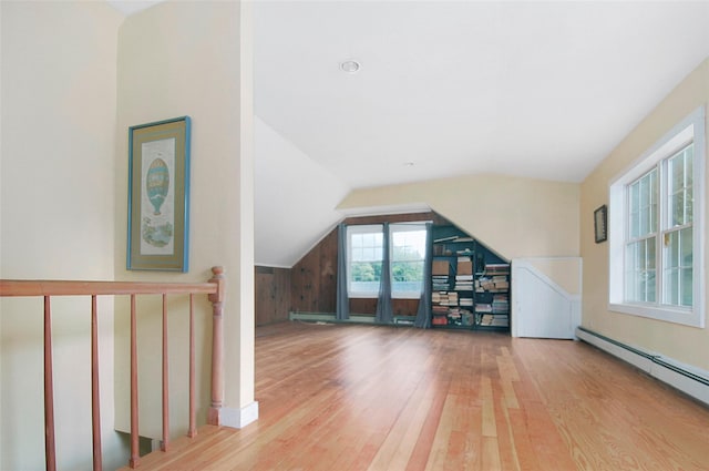 28 Gobblers Knob Rd, Pawling, NY 12564 - additional living space with baseboard heating, wood finished floors, and lofted ceiling
