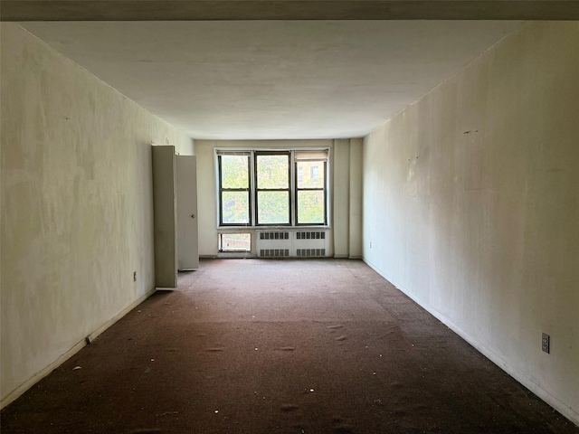 58-03 Calloway St Unit 3Ee, Corona, NY 11369 - spare room with radiator and carpet