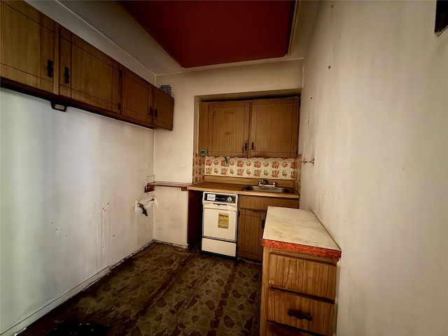 58-03 Calloway St Unit 3Ee, Corona, NY 11369 - kitchen featuring light countertops, brown cabinetry, dishwasher, and tasteful backsplash