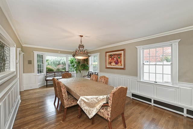3223 214th St, Bayside, NY 11361 - dining space with a decorative wall, crown molding, plenty of natural light, a wainscoted wall, and dark wood-style flooring