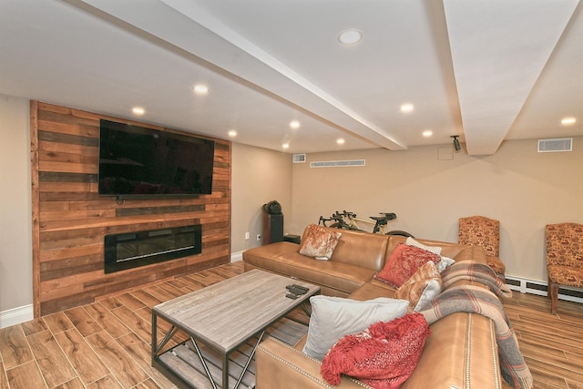 3223 214th St, Bayside, NY 11361 - living area featuring wood finished floors, recessed lighting, and a fireplace