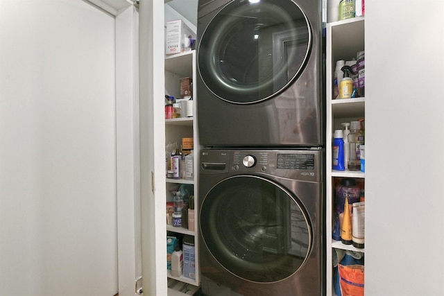 3223 214th St, Bayside, NY 11361 - washroom featuring estacked washer and dryer