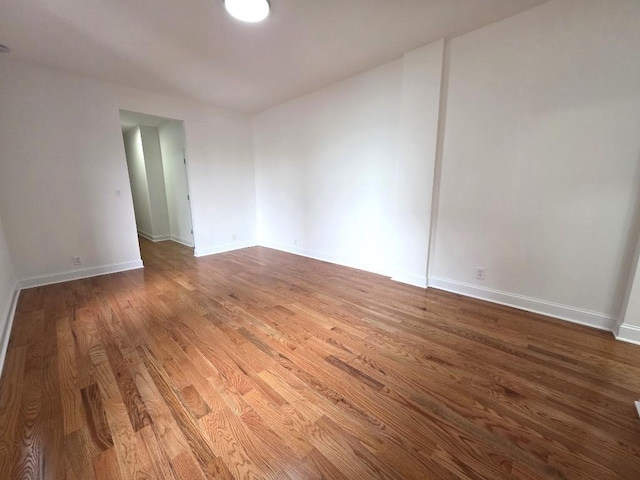 43-42 45th St Unit 4O, Sunnyside, NY 11104 - unfurnished room with wood finished floors and baseboards