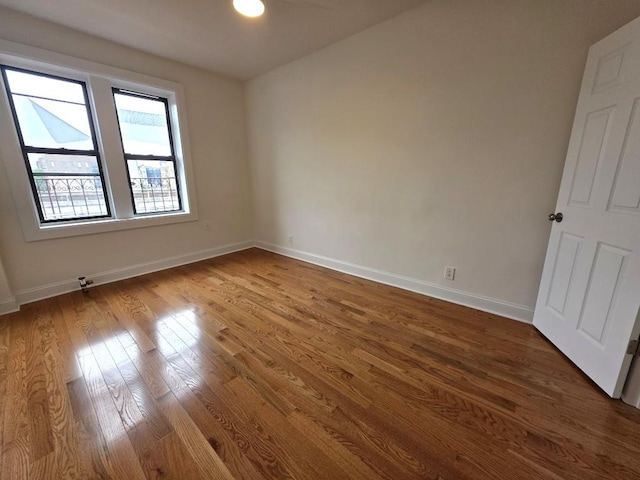 43-42 45th St Unit 4O, Sunnyside, NY 11104 - unfurnished room featuring dark wood-style floors