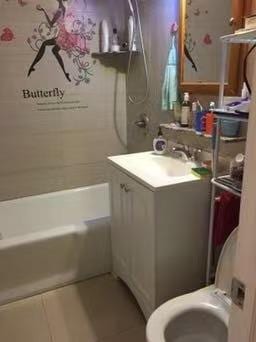 7806 46 Unit 7A, Elmhurst, NY 11373 - bathroom with vanity and tile patterned flooring