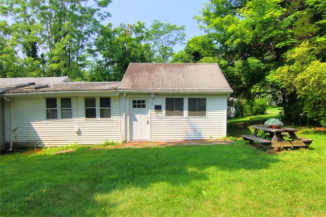 191 Sylvan Lake Rd Unit 1, Hopewell Junction, NY 12533 - view of front of house featuring a front yard and roof with shingles