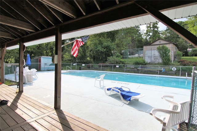 191 Sylvan Lake Rd Unit 1, Hopewell Junction, NY 12533 - community pool with a storage shed and a wooden deck