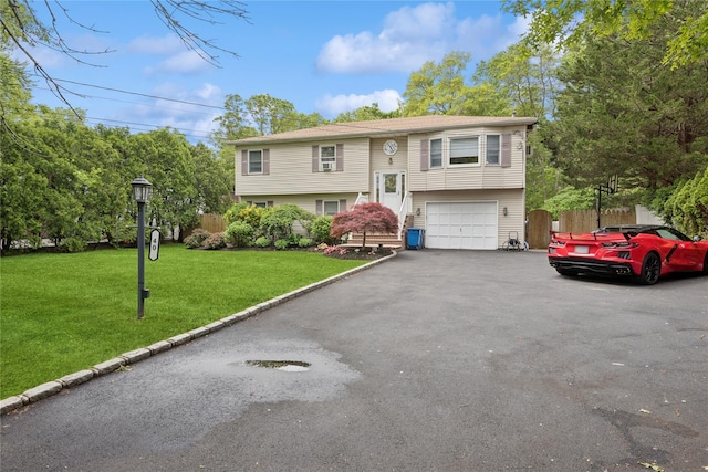 40 Dillmont Dr, Smithtown, NY 11787 - bi-level home with a garage and driveway