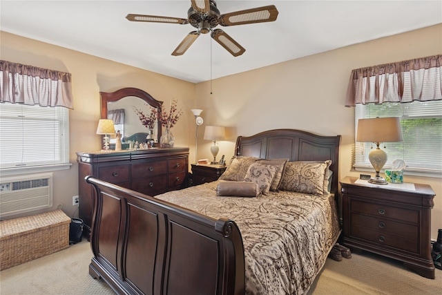 40 Dillmont Dr, Smithtown, NY 11787 - bedroom with light carpet, a wall mounted AC, and a ceiling fan