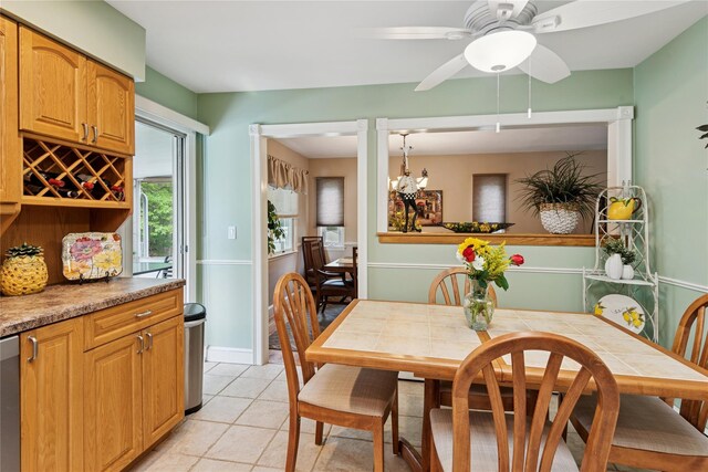 40 Dillmont Dr, Smithtown, NY 11787 - dining room featuring light tile patterned floors and ceiling fan