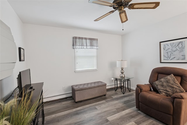 40 Dillmont Dr, Smithtown, NY 11787 - sitting room with a baseboard heating unit, wood finished floors, and a ceiling fan