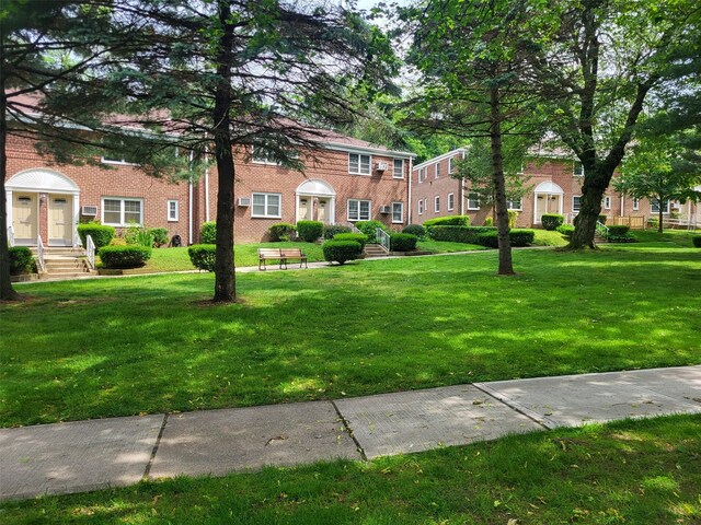 224-23 Kingsbury Ave Unit B, Oakland Gardens, NY 11364 - view of home's community featuring a yard