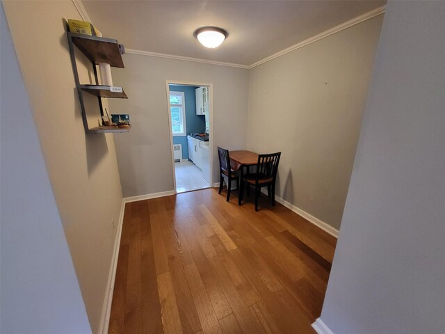 224-23 Kingsbury Ave Unit B, Oakland Gardens, NY 11364 - dining space featuring hardwood / wood-style flooring and ornamental molding