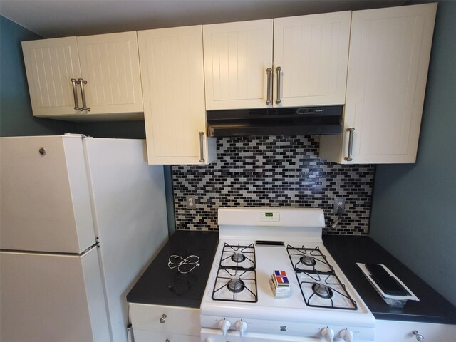 224-23 Kingsbury Ave Unit B, Oakland Gardens, NY 11364 - kitchen with white appliances, under cabinet range hood, and decorative backsplash