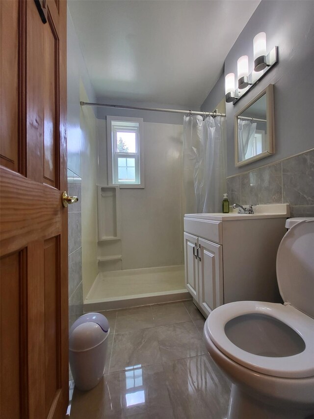 224-23 Kingsbury Ave Unit B, Oakland Gardens, NY 11364 - bathroom featuring tile walls, vanity, and a shower with curtain