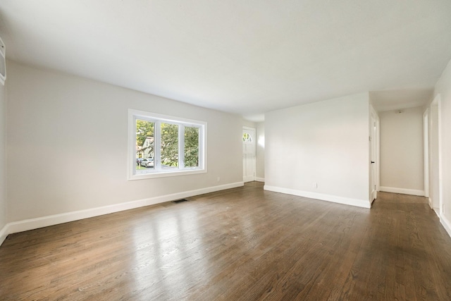 68 Henmond Blvd, Poughkeepsie, NY 12603 - unfurnished room featuring dark wood finished floors and baseboards