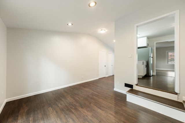 68 Henmond Blvd, Poughkeepsie, NY 12603 - unfurnished living room featuring dark wood finished floors, recessed lighting, and vaulted ceiling