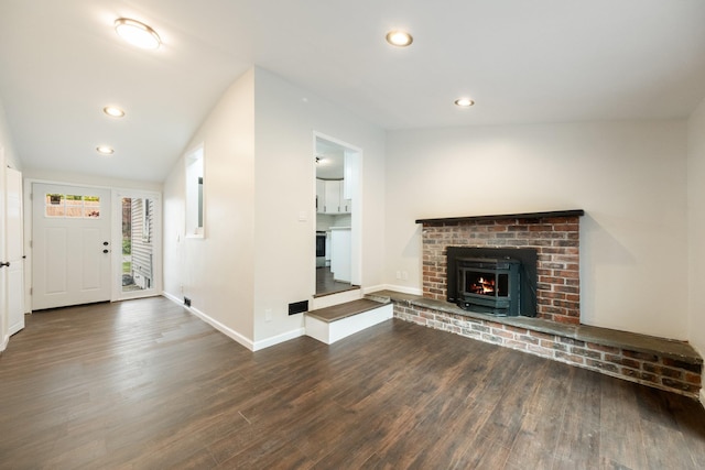 68 Henmond Blvd, Poughkeepsie, NY 12603 - unfurnished living room with wood finished floors, a brick fireplace, and recessed lighting