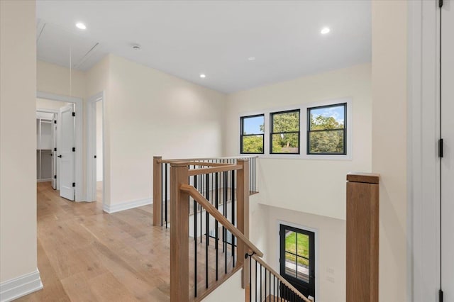 4 Haven Ln, Old Bethpage, NY 11804 - hall featuring an upstairs landing, attic access, healthy amount of natural light, light wood-style flooring, and recessed lighting