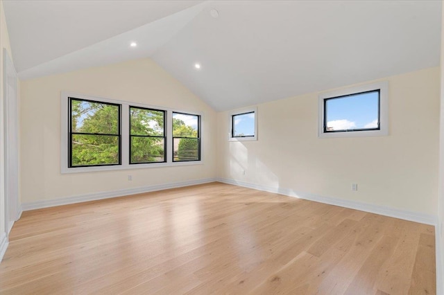4 Haven Ln, Old Bethpage, NY 11804 - spare room with light wood finished floors, lofted ceiling, and recessed lighting
