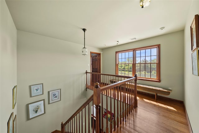 2706 Sound Ave, Calverton, NY 11933 - corridor with an upstairs landing and wood finished floors