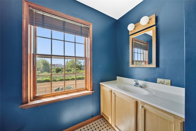 2706 Sound Ave, Calverton, NY 11933 - bathroom with baseboards and vanity