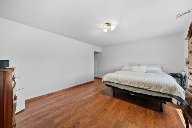 2706 Sound Ave, Calverton, NY 11933 - bedroom with wood finished floors and baseboards