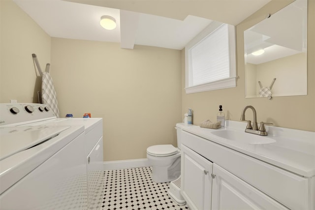131 E 238th St, Bronx, NY 10470 - bathroom with washing machine and dryer, vanity, and tile patterned flooring