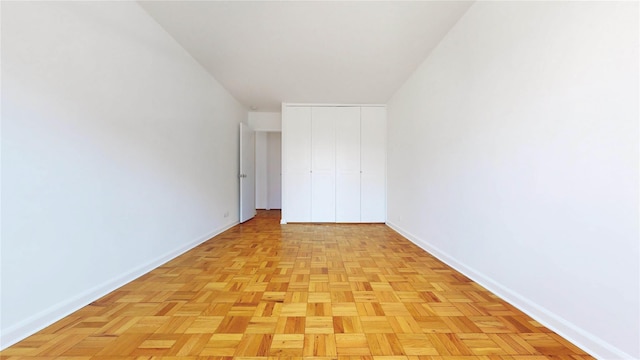 2500 Johnson Ave Unit 4L, Bronx, NY 10463 - unfurnished bedroom with baseboards and a closet
