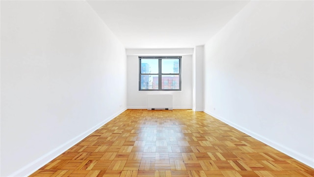 2500 Johnson Ave Unit 4L, Bronx, NY 10463 - unfurnished room with radiator and baseboards