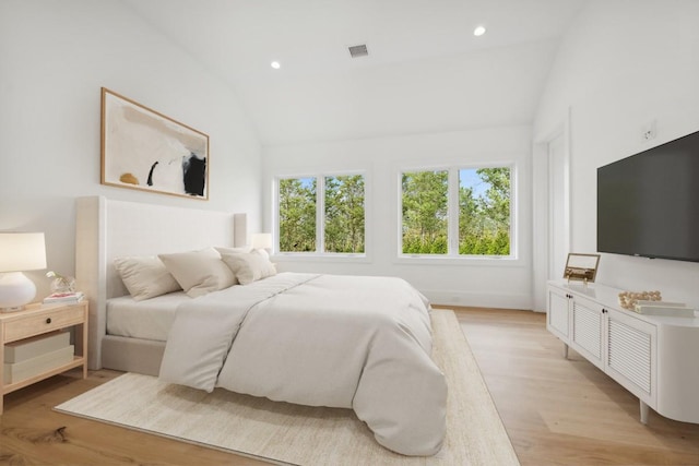 10 Broadwood Ct, Wainscott, NY 11975 - bedroom with lofted ceiling, light wood-style floors, and recessed lighting