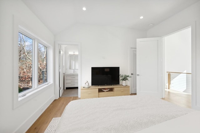 10 Broadwood Ct, Wainscott, NY 11975 - bedroom with lofted ceiling, light wood finished floors, recessed lighting, and connected bathroom