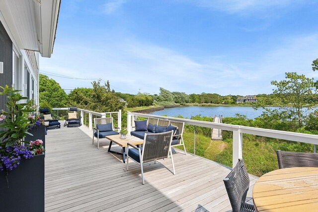 801 Montauk Hwy, Westhampton Beach, NY 11978 - deck with an outdoor hangout area and a water view
