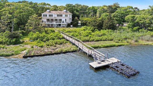 801 Montauk Hwy, Westhampton Beach, NY 11978 - dock featuring a water view and a forest view