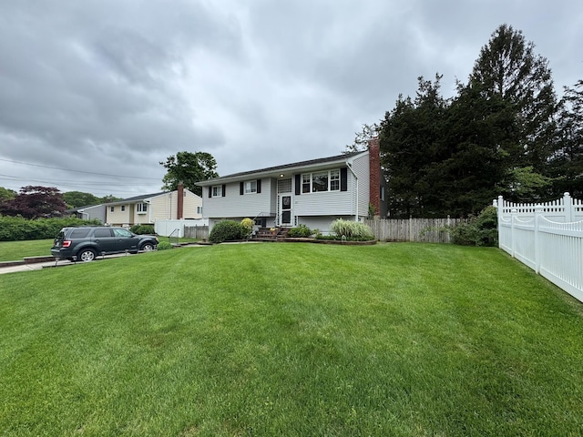 20 Bayberry Rd, Ronkonkoma, NY 11779 - raised ranch with a chimney