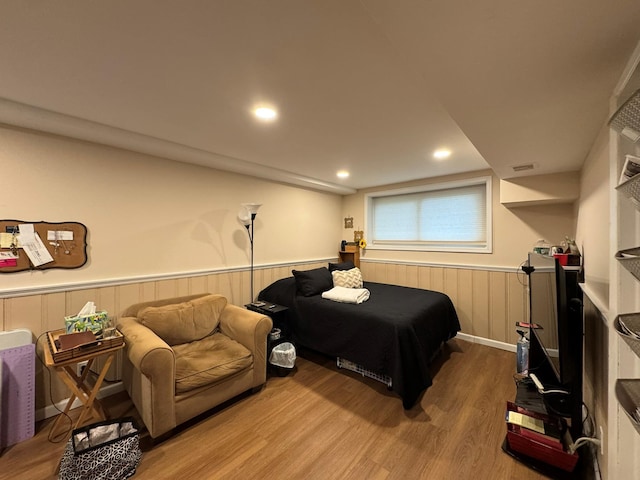 20 Bayberry Rd, Ronkonkoma, NY 11779 - bedroom featuring wainscoting and wood finished floors