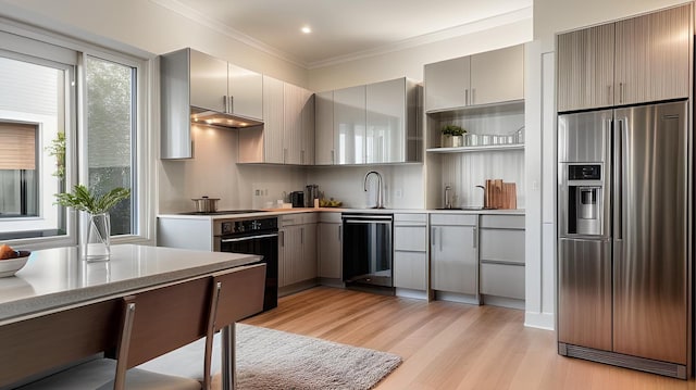 2825 Wellman Ave, Bronx, NY 10461 - kitchen with stainless steel fridge with ice dispenser, gray cabinets, light countertops, ornamental molding, and light wood-style flooring