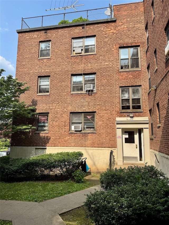 144-14 77th Rd Unit 1B, Kew Garden Hills, NY 11367 - view of property featuring cooling unit