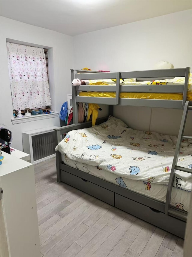 144-14 77th Rd Unit 1B, Kew Garden Hills, NY 11367 - bedroom with light wood-style flooring
