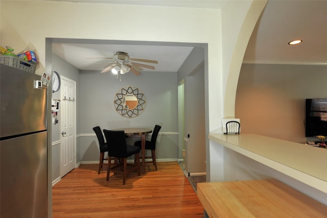 129-1 S Highland Ave Unit B6, Ossining, NY 10562 - dining room featuring light wood-type flooring, a ceiling fan, arched walkways, and recessed lighting