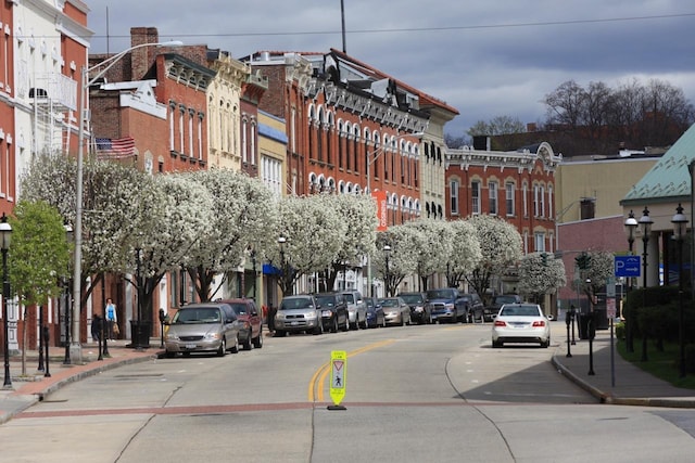 129-1 S Highland Ave Unit B6, Ossining, NY 10562 - view of concrete street with street lights, sidewalks, and curbs